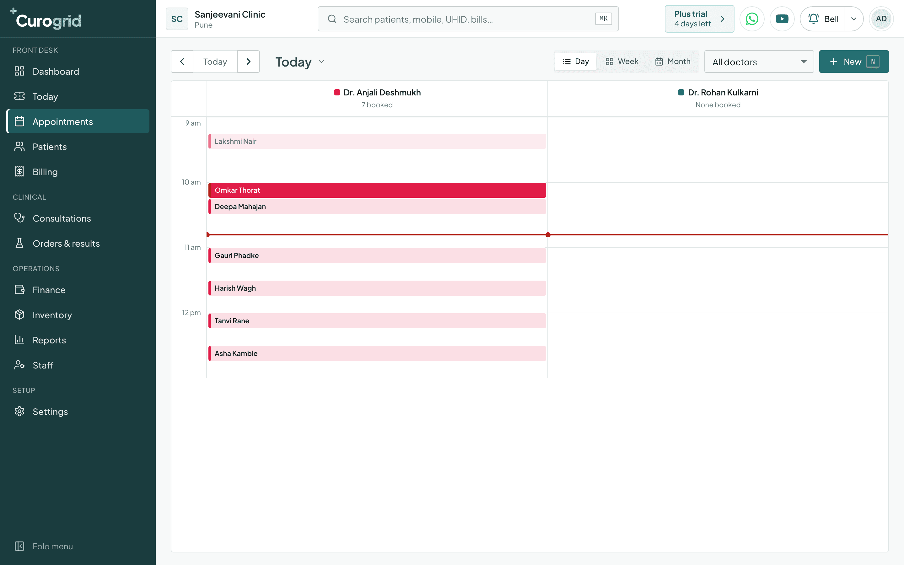 Curogrid's appointment book in day view, one column for each doctor, with the morning's bookings
